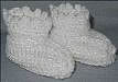 white slip on baby booties